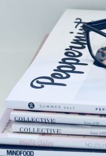 Photo of Eyeglasses On Top of Magazines