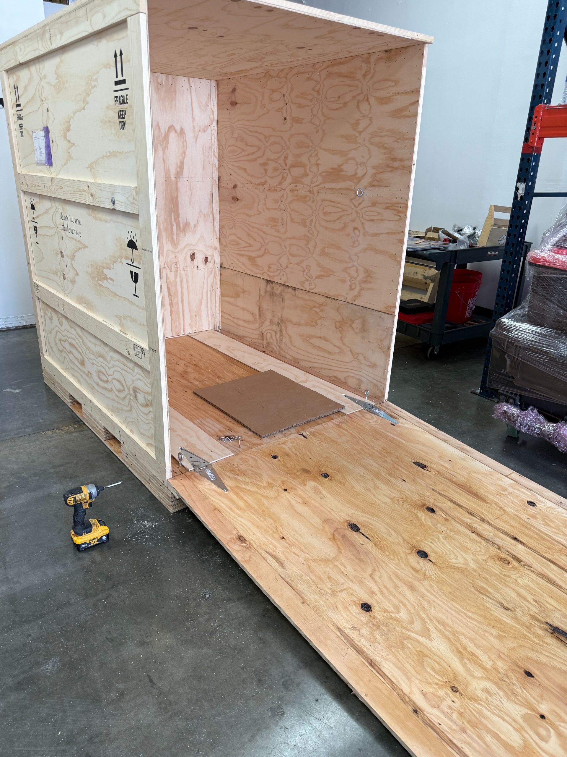 In this photo is a "tradeshow crate" with link locks.  The custom wood shipping crate is to ship antiques, electronics.