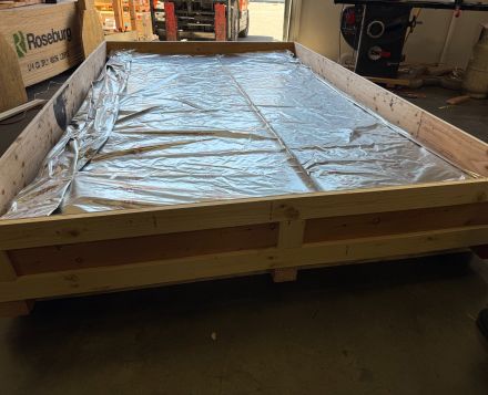 This is a heat treated wood shipping crate with a moisture vapor barrier bag w/ dessicant