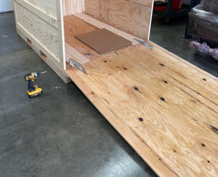 A custom wood crate with a ramp for shipping a server for a silicon valley company