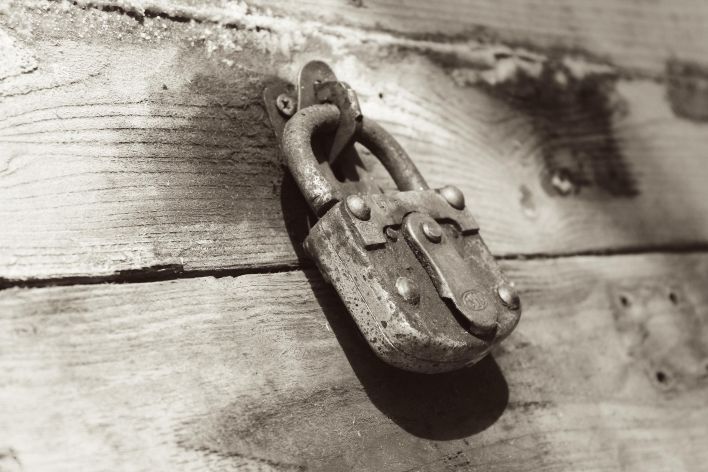 Padlock on wood box