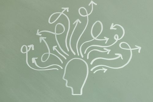 Abstract illustration symbolizing mental health and ADHD awareness with arrows representing thoughts.