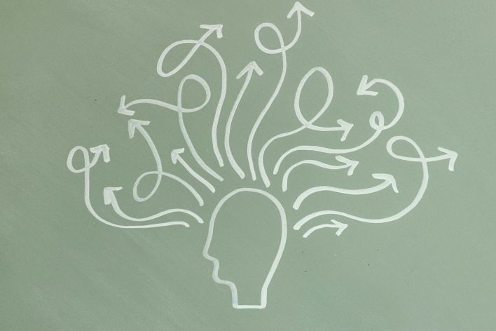 Abstract illustration symbolizing mental health and ADHD awareness with arrows representing thoughts.